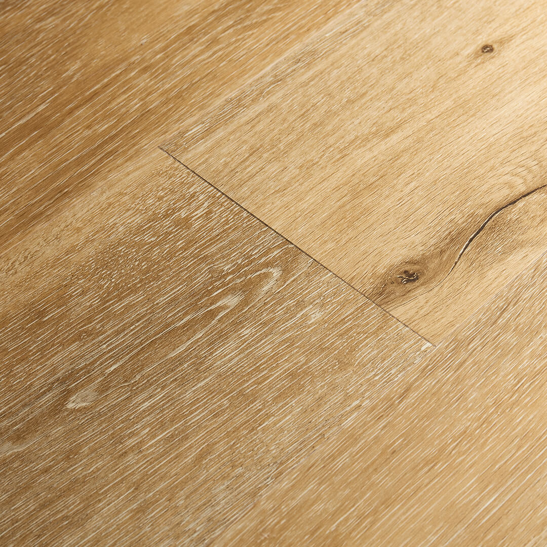 Artisan Hardwood Innova Howell Mountain waterproof SPC vinyl plank flooring in a light natural oak tone, close-up