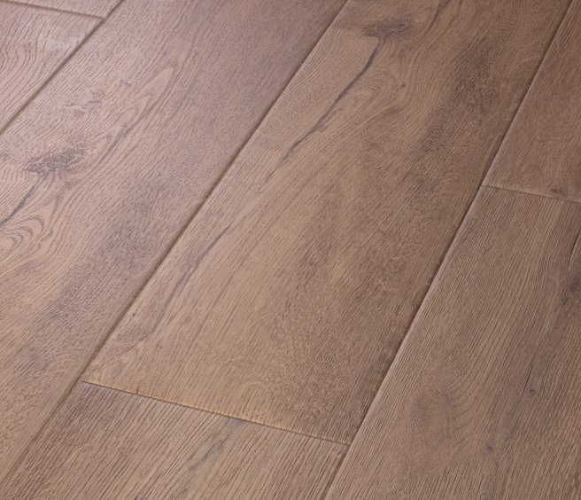 COREtec Cerith Oak luxury vinyl plank with warm medium-brown oak grain and subtle dark mineral streaks