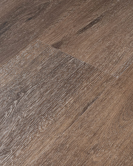 Provenza Double Dare waterproof luxury vinyl plank in a smoky brown oak tone