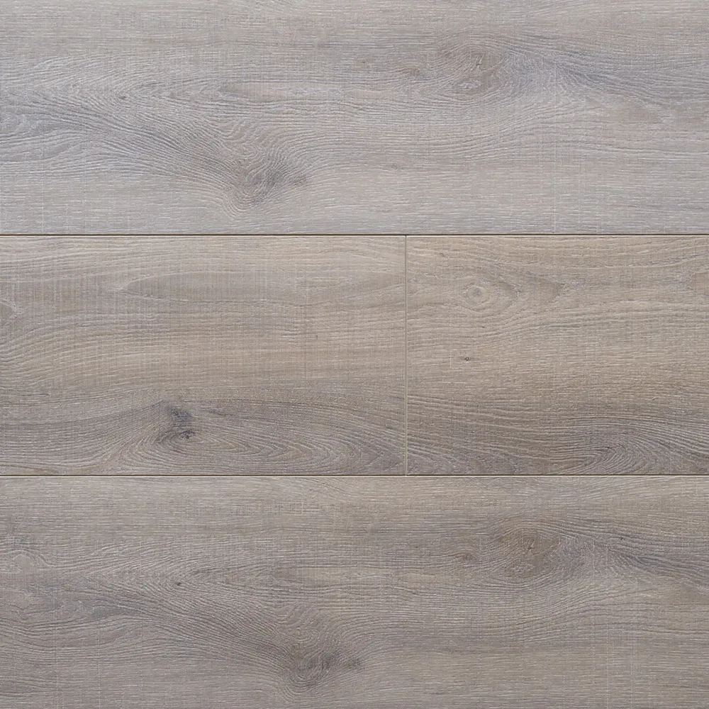 Artisan Hardwood Innova King Canyon Oak waterproof SPC vinyl plank flooring in a soft gray wire-brushed oak tone, close-up